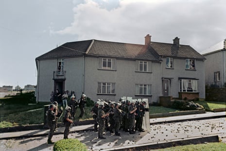 British soldiers in riot gear during a protest, Creggan Estate, Derry, c1970
