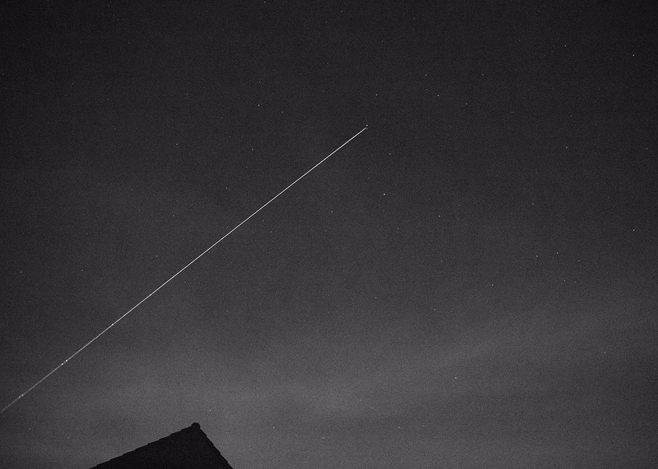 An astronomer highlights a star with a laser pointer, Mol, Belgium, 2020.